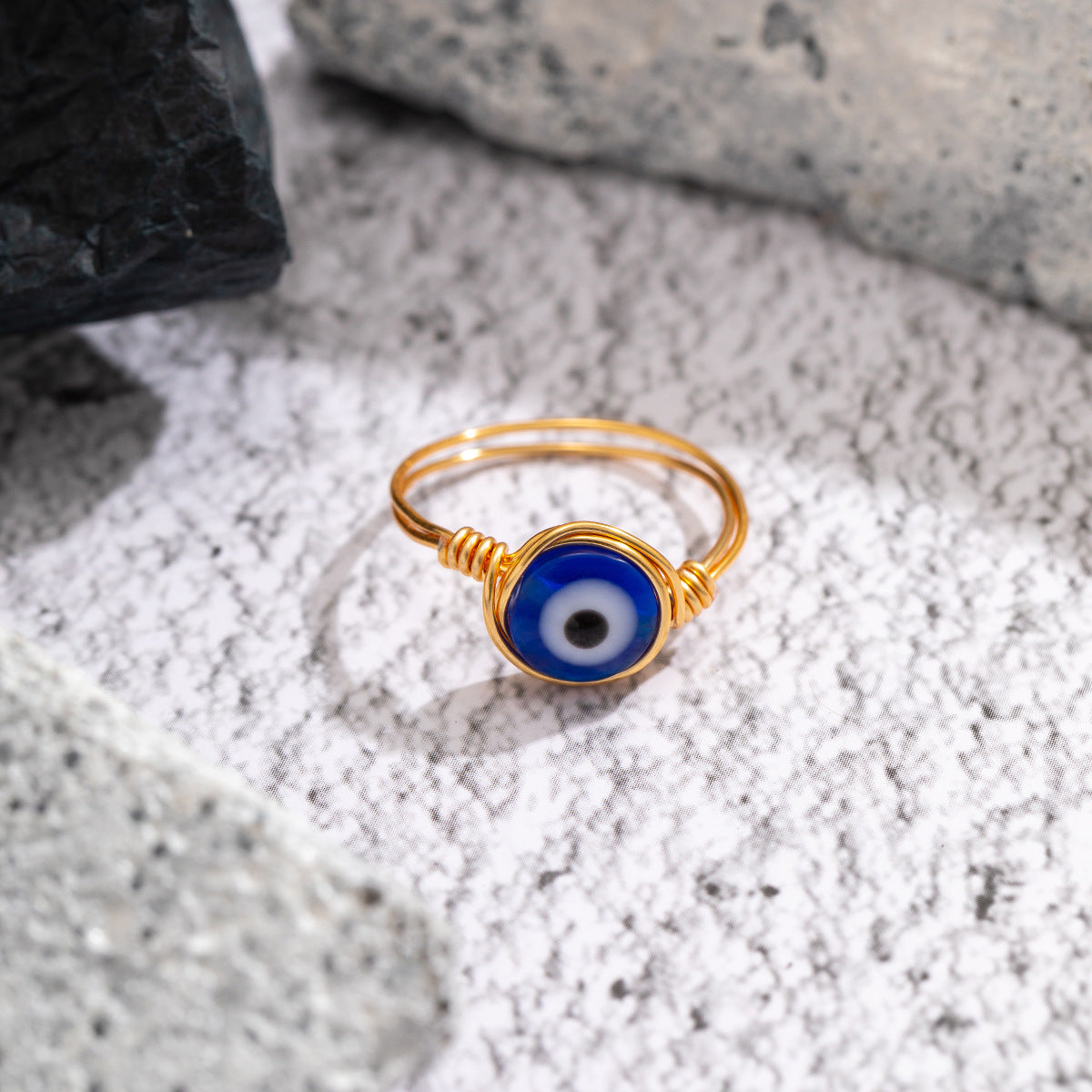 Anillo de ojos azules acrílicos al por mayor